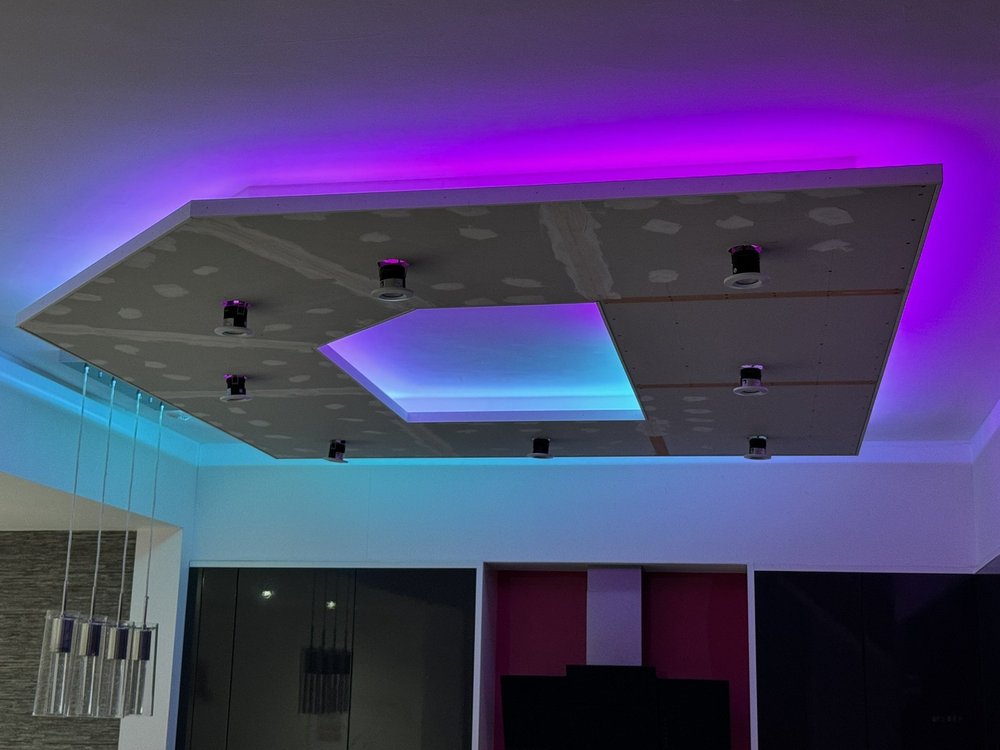 Kitchen with LED dropdown ceiling and island lighting in Grays, Essex