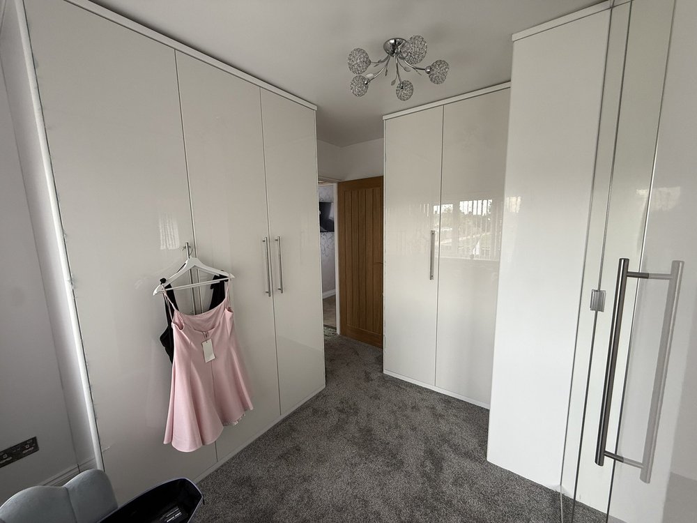 Bespoke fitted wardrobes with chandelier in Tilbury